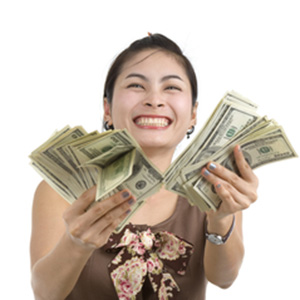 Girl showing the cash she received from the sale of your annuity.